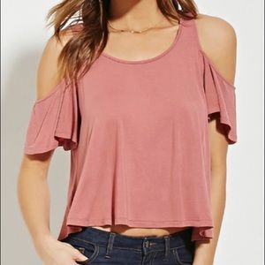 Contemporary open shoulder top in light blue